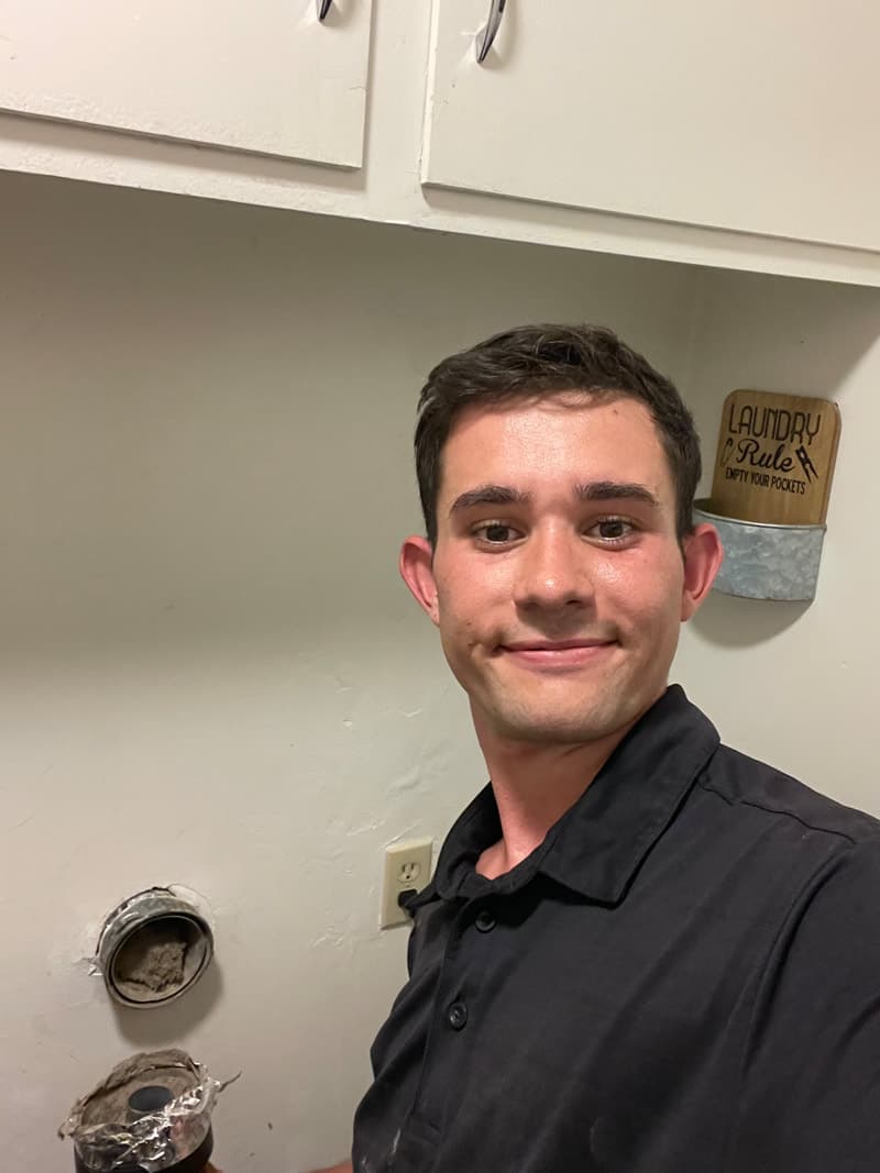 LintFree Dryer Vent Cleaning service truck and trailer at residential property